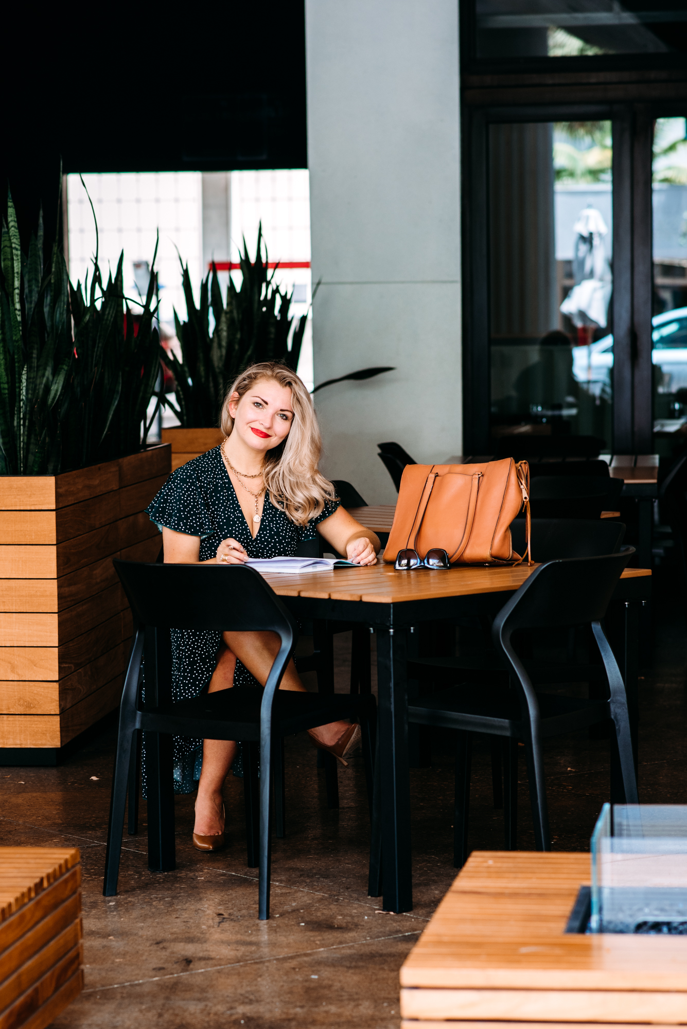 Personal Brand photoshoot for life coach at modern outdoor space.